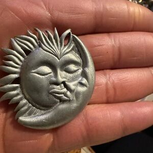 Vintage sun and moon pewter brooch